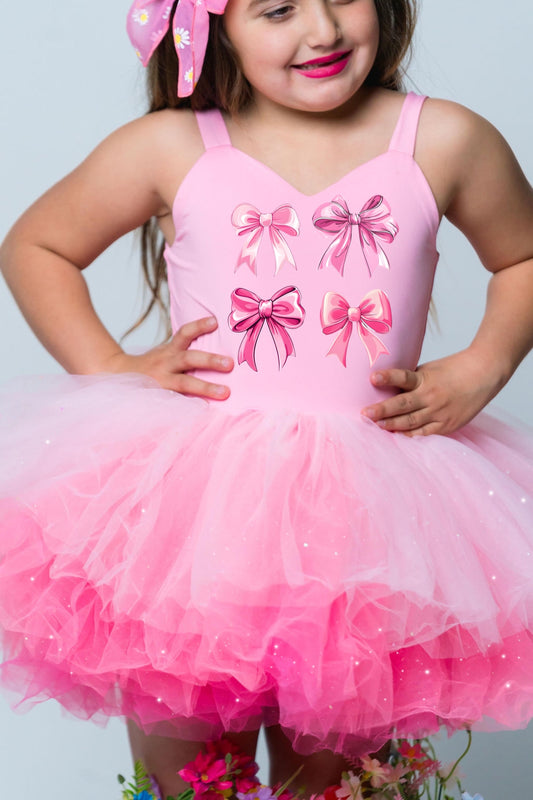 Pink coquette image on a one piece pink ombré with glitter soft tulle